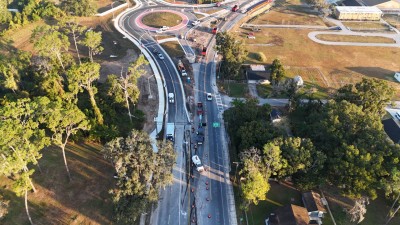 Looking north over US 98 / US 301 at the partially opened roundabout at  7th Street (11-19-2025 photo)