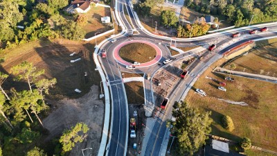 Looking north over US 98 / US 301 at the partially opened roundabout at  7th Street (11-19-2025 photo)
