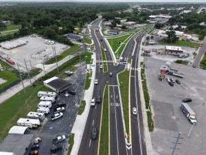Looking south over the US 98 Bypass south of Lock Street at final paving and marking (6-1-2026 photo)