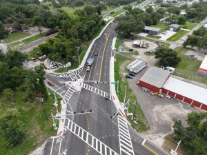 Looking southeast over the US 98 Bypass at River Road at final paving and marking (6-1-2026 photo)