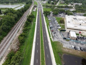 Looking south over the US 98 Bypass toward Meridian Avenue at final paving and marking (6-1-2026 photo)
