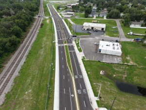 Looking south over the US 98 Bypass toward Church Avenue at final paving and marking (6-1-2026 photo)