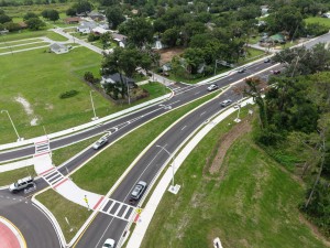 Looking northwest over the US 98 Bypass from the roundabout to 7th Street at final paving and marking (6-1-2026 photo)