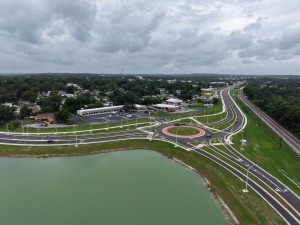 Looking north at the US 98 Bypass at the roundabout at Old Lakeland Highway at final paving and marking (6-1-2026 photo)