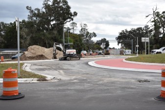 Crews work to finish up the last branches of the roundabout to open all movements (12-9-2025 photo)