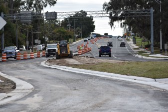 Crews work to finish up the last branches of the roundabout to open all movements (12-9-2025 photo)