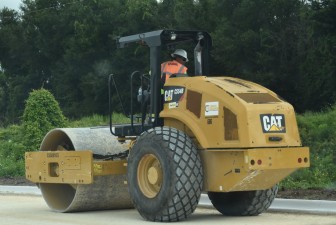 Compacting the base for the new northbound roadway on the US 98 Bypass (9-8-2025 photo)