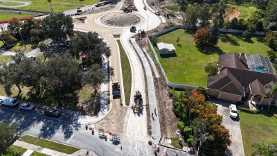 Fine grading the lime rock on the 7th Street connection to the US 98/US 301 roundabout (11-7-2025 photo)