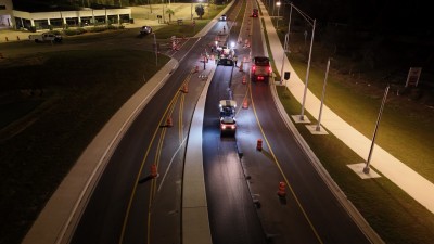 Crews have begun paving the top layer of asphalt (friction course) on the US 98 Bypass (3-9-2026 photo)