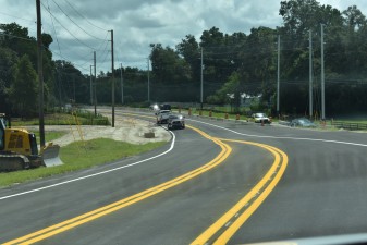 Looking southeast at the new alignment of County Line Road, east of the new Ayers Road extension. (8/27/2021 photo)