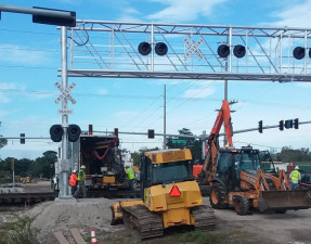 Crews work on the closed intersection of Sam Allen Road and Paul Buchman Highway (November 2019 photo)
