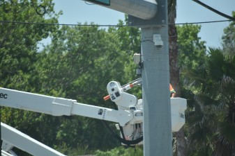 Working on signal components at a US 19 intersection (5/17/2022 photo)