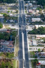 Looking north over US 19 at the intersections of W Halls River Rd. / W Grover Cleveland Blvd. and W Homosassa Trail (3-7-2023 photo)