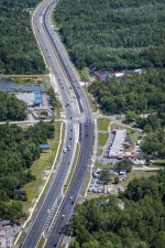 Looking north over US 19 at S Jump Court and the transition between two widening projects (5-5-2023 photo)