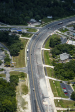 Looking northwest at US 19, with Yulee Drive near the top left of the photo. To the right, the northbound lanes are almost completed.  (August 10, 2020 photo)