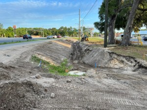 Grading a ditch along northbound US 19 (April 2023 photo)