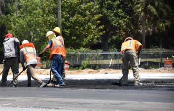 Workers finishing asphalt in the median of US 19 (5/17/2022 photo)