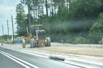 Building the multi-use trail next to the eastbound lanes of SR 54 (4-11-2023 photo)