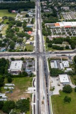 Looking west over SR 54 at the Morris Bridge Rd. / Eiland Blvd. intersection (6-16-2023 photo)