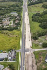 Looking east over SR 54 at new eastbound SR 54 construction at Fox Ridge Blvd. (6/15/2021 photo)