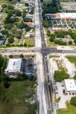 Looking west over SR 54 at the Eiland Blvd. / Morris Bridge Rd. intersection (5/17/2022 photo)