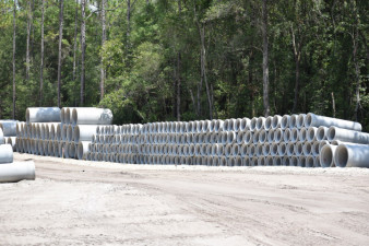 Drainage pipe stockpile for installation along SR 50 (7/17/20 photo)