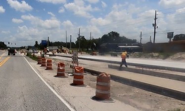 Looking east at new concrete roadway approaching US 301 (8/17/2021 photo)