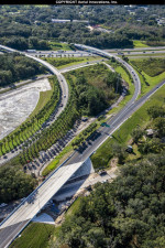 The roadway to the right in this photo shows the two lanes on the southbound I-75 ramp to I-4 crossing over Sligh Avenue and then splitting towards eastbound and westbound I-4.