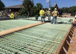 Crews inpect bridge deck before placing concrete deck May 2018