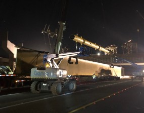 A bridge beam is ready to be lifted from the transport truck on I-75 (photo 1/17/2022)
