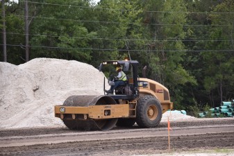 Building the roadway base for Overpass Road, east of I-75 (6/10/2021 photo)