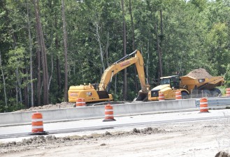Working in the area that will be the southbound I-75 exit ramp to Overpass Road (6/10/2021 photo)