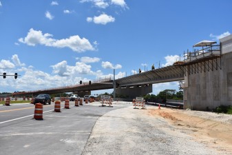 Looking west on Overpass Road at bridge construction (photo 7/6/2022)