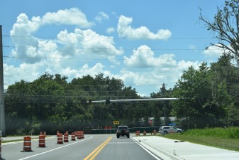 Looking west on Overpass Rd. at the intersection of Old Pasco Rd. where traffic signals are expected to be activated by late summer 2022 (photo 7/6/2022)