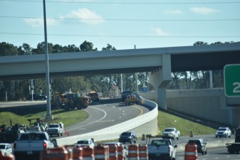 Crews completing final tasks on the Overpass Road entrance ramp onto northbound I-75 (1/9/2023 photo)