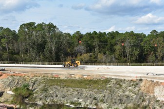 Looking north at reconstruction of Overpass Road on the west side of I-75 (12/9/2021 photo)