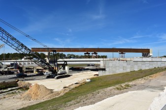 Looking northwest at bridge construction at the new I-75 / Overpass Road interchange (1/24/2024 photo)