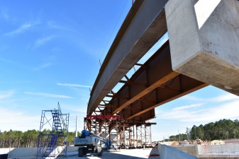 Steel girders are installed for the new bridge that will carry westbound Overpass Road traffic onto southbound I-75 (1/24/2024 photo)
