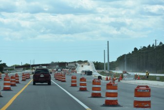 Looking west on Overpass Road towards construction of the ramp onto southbound I-75 (5/12/2022 photo)