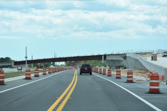 Looking west on Overpass Road approaching the bridge that will take traffic onto southbound I-75 (5/12/2022 photo)