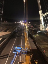 Traffic is directed off/on at the ramps while a steel girder is prepared to be lifted into place (1/21/2022 photo)