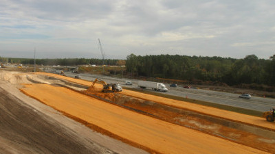 Looking northeast at construction of the ramps onto southbound I-75 (2/12/2021 photo)
