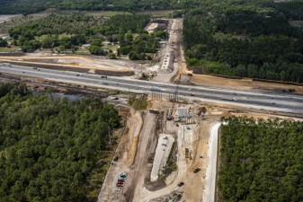 Looking west over Overpass Road at construction at I-75 (3/15/2021 photo)