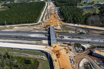 Looking east at construction of the new westbound Overpass Road bridge over I-75 (11/15/2021 photo)