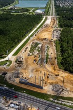 Looking east at reconstruction of Overpass Rd. on the east side of I-75. (8/17/2021 photo)