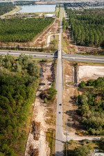 Looking east at Overpass Road over I-75. Clearing is taking place for Overpass Road widening, I-75 interchange ramps, and local road realignments. (December 13, 2020 photo)