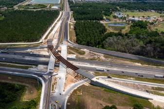 Looking east at construction of the new Overpass Road interchange from I-75 to Boyette Road (5/17/2022 photo)