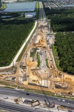 Looking east at interchange construction and Overpass Road reconstruction, east of I-75 (7/15/2021 photo)