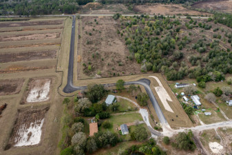 Looking west at the new Blair Drive extension to Old Pasco Road that opened February 5, 2021 (2/15/2021 photo)