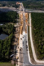 Looking west at reconstruction of Overpass Road and new I-75 interchange construction (1/17/2022 photo)